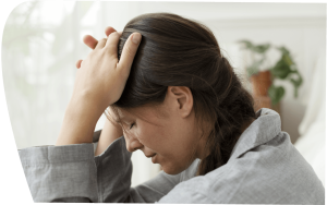 person-suffering-from-anxiety-looking-out-window-banner